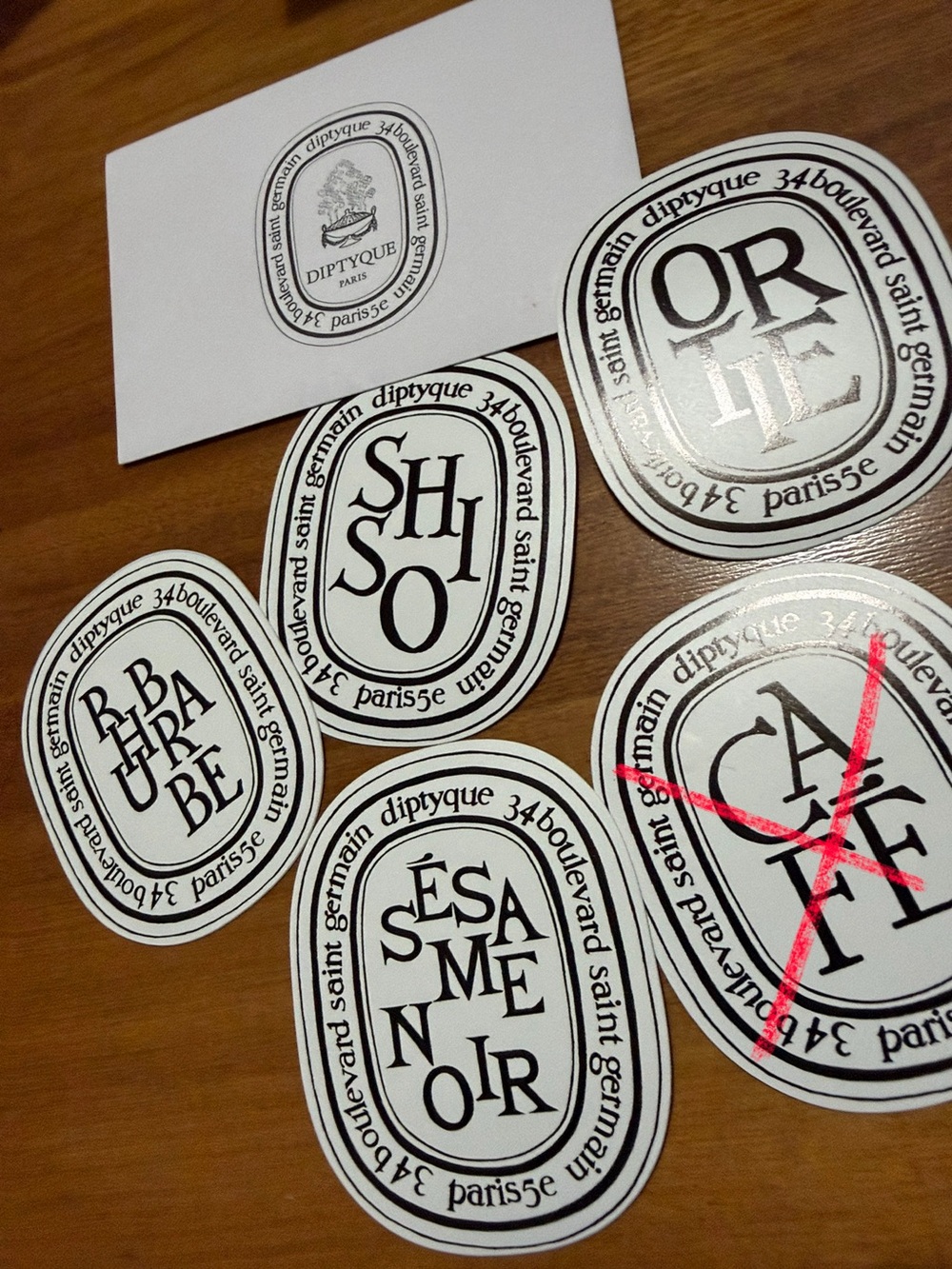Diptyque stickers SET OF FOUR — shiso, sesame noir, rhubarb, and ortie